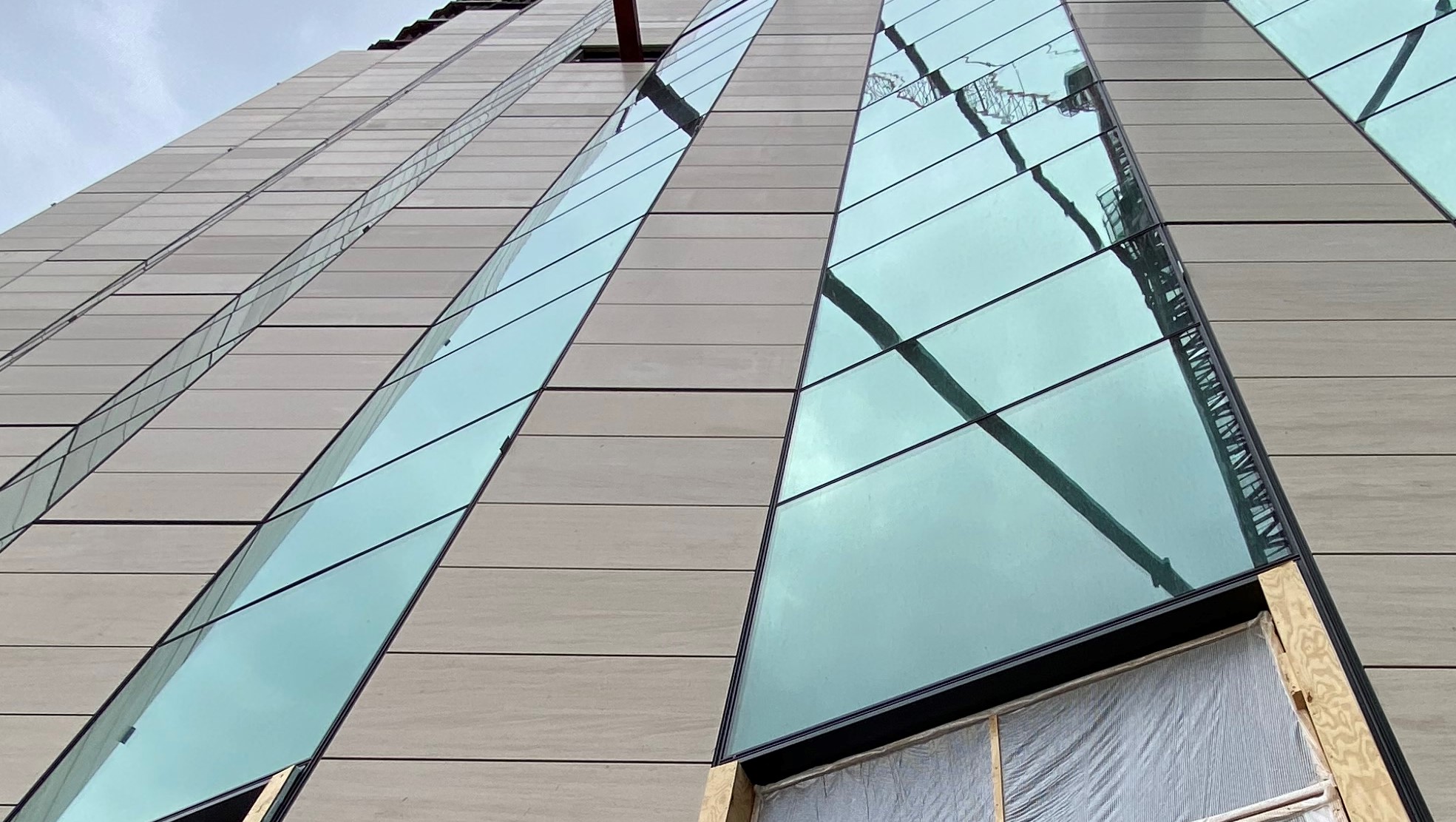 Prefabricated panels clad the exterior of the OSU Tower